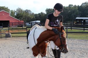 JJ demands pre-ride cuddles. When his behavior changed and he nipped my leg, I knew something was up.